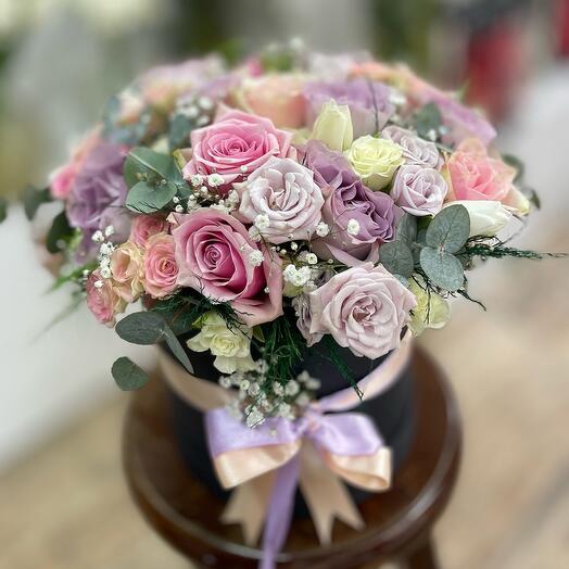 Colorful fresh roses in the box