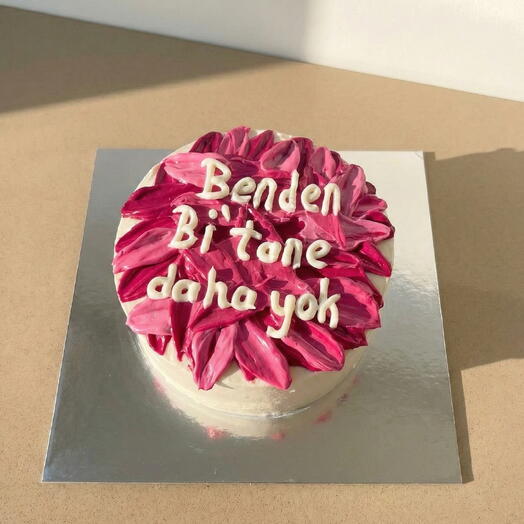 Bento cake with "There's no one else like me" written on it