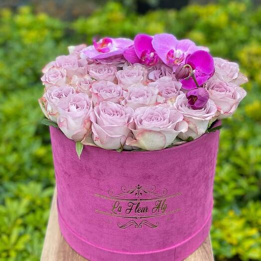 Lilac roses in a box