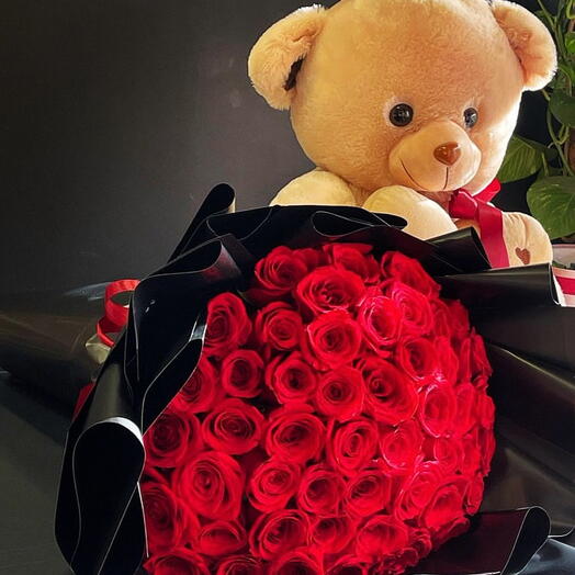 75 roses and a teddy bear
