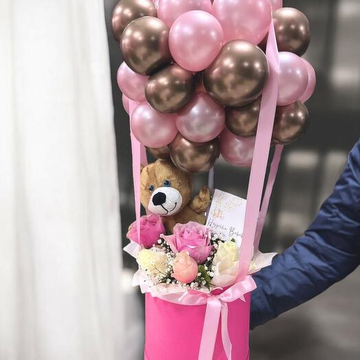 Rose arrangement with balloons