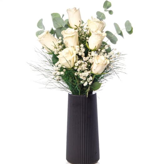 7 White Roses in Black Polymer Pot