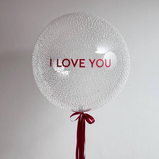 Üzerinde yazı olan  ve içinde kopuk bulunan bubble balon