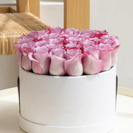 Purple roses box arrangement