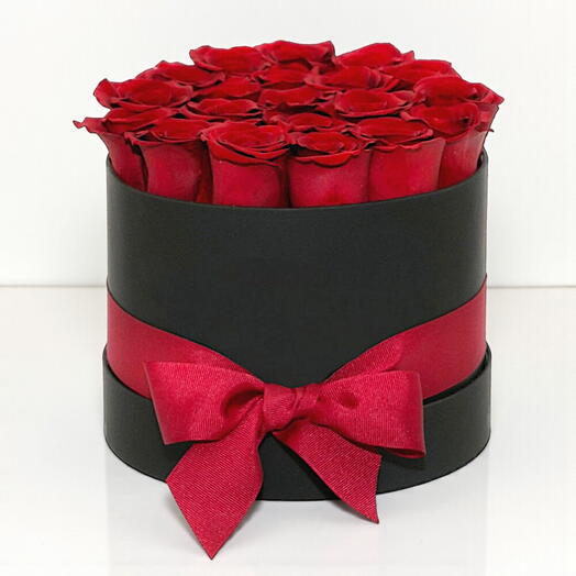 Kırmızı gullu silindirik kutu